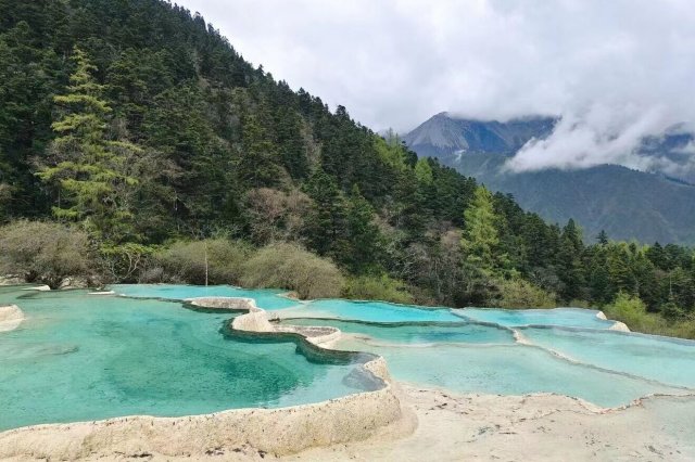 阿坝州特色藏羌文化_阿坝藏族羌族自治州旅游_阿坝州羌族自治区旅游